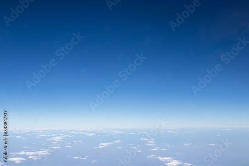 White clouds in the blue sky. Natural background and texture.
