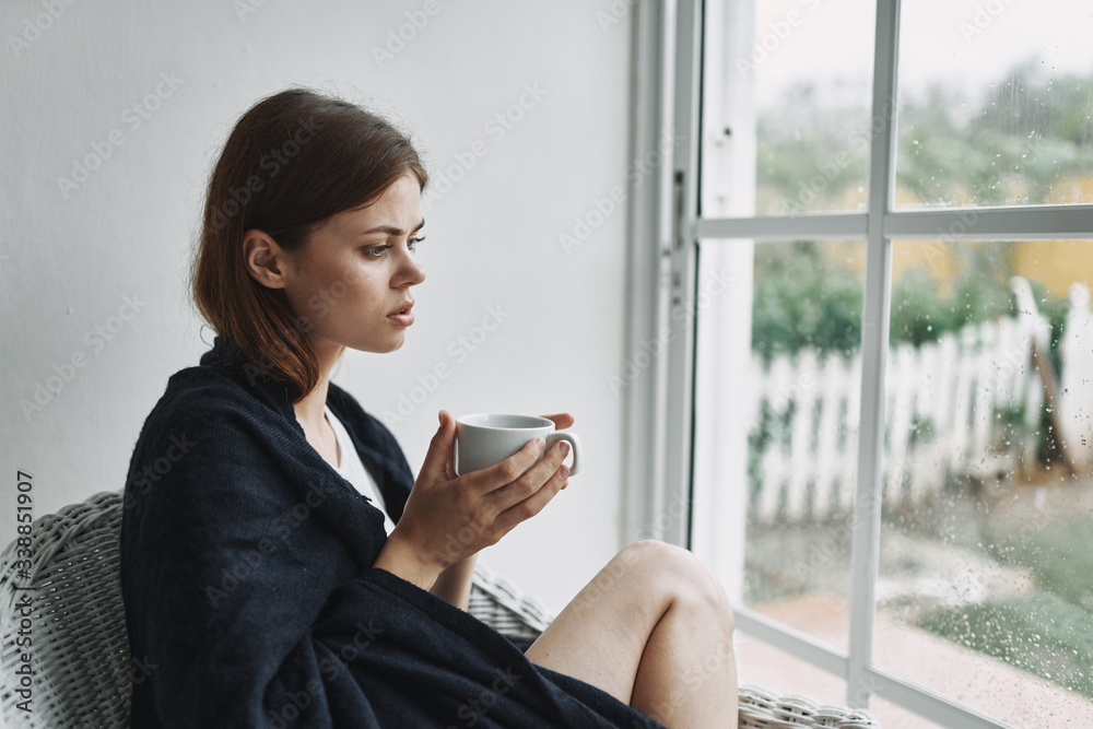 young businesswoman drinking coffee in cafe