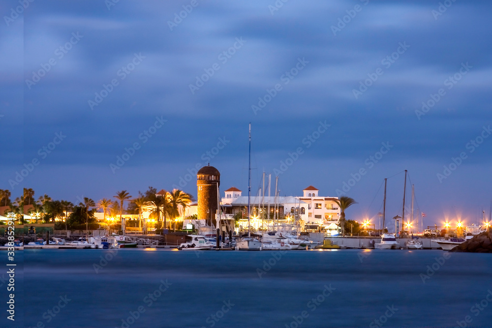 Marina with lighthouse in Caleta de Fuste, Fuerteventura, Canary Islands, Spain, Europe