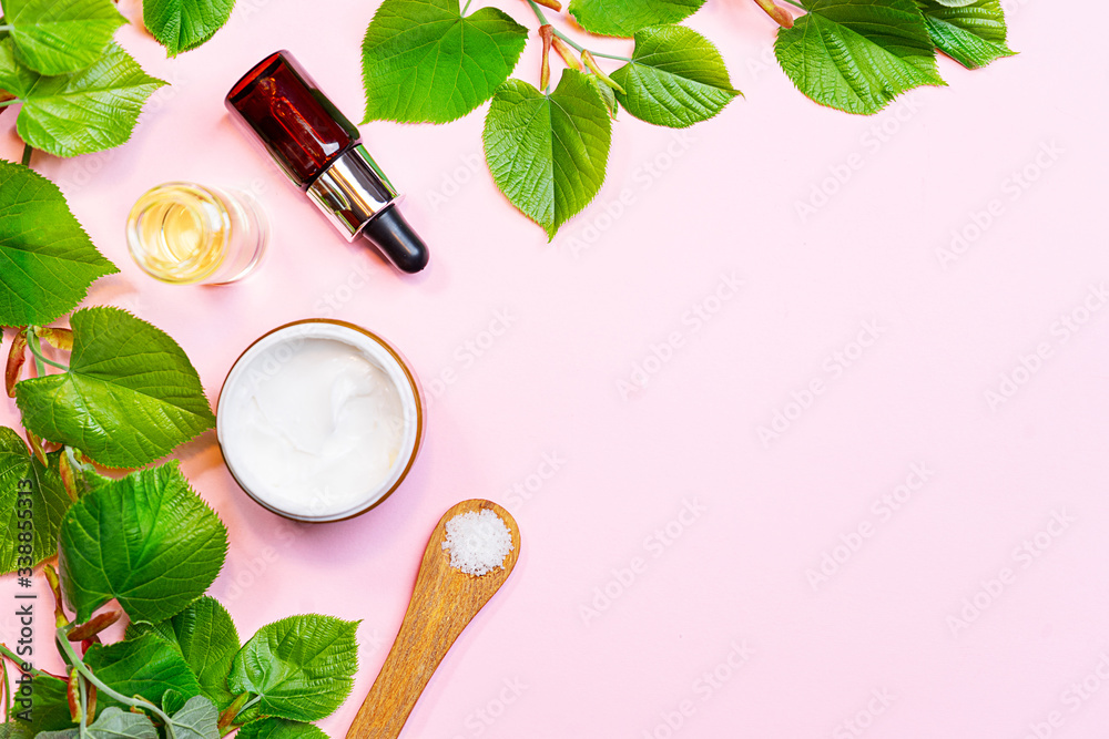 Skin care products, natural cosmetic. Flat lay image on pink background.