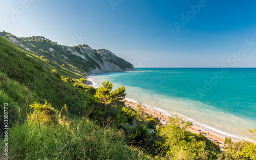 Fototapeta Naklejka Na Ścianę i Meble -  The Mezzavalle beach along the mount Conero coastline near Ancona during the summer (Marche, Italy)