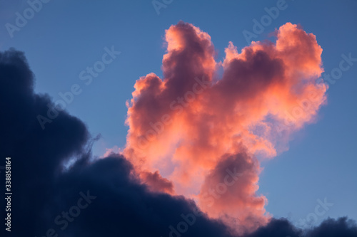 Pink morning cloud in the blue sky © Dudarev Mikhail
