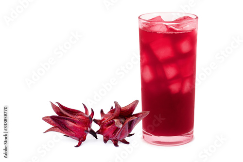 glass of roselle juice tea and flower isolated on white background.  photo