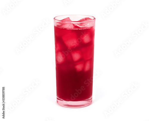Fotografie Red roselle juice with ice cubes in glass isolated on white