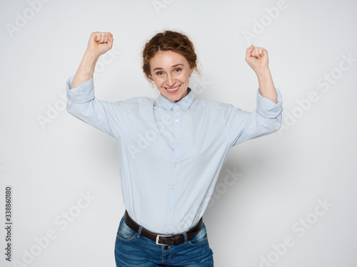 young man with arms raised