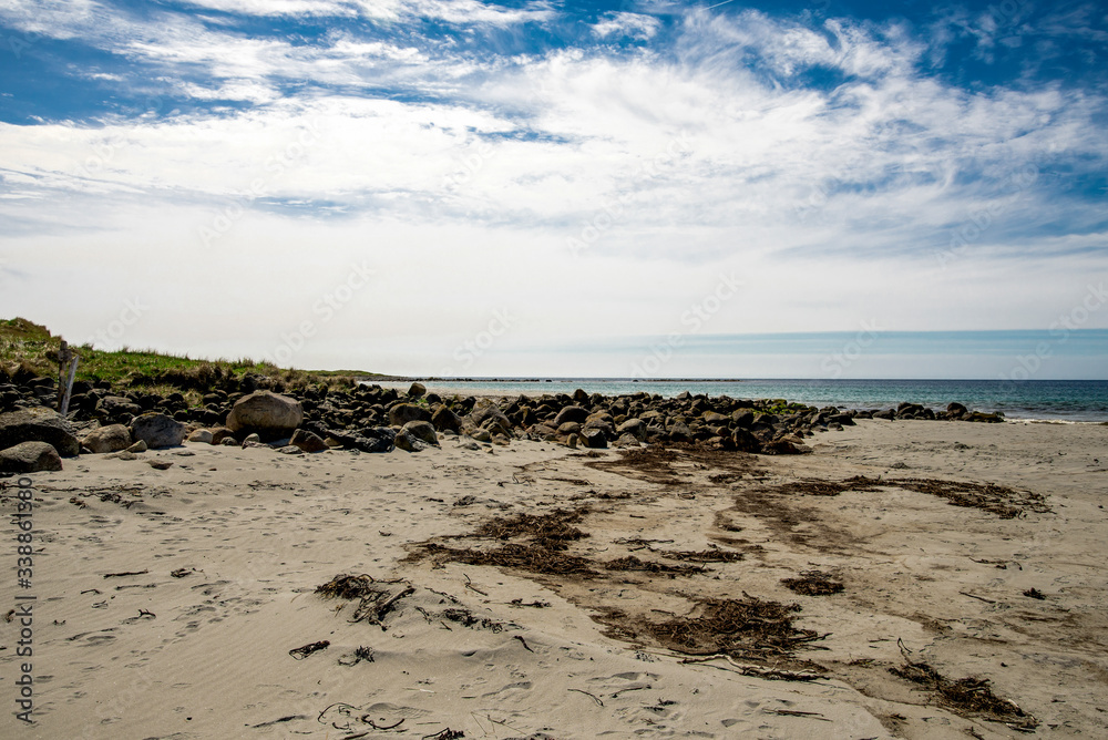 Scenic rocks and large boulders on Refsnesstranda beach near Naerbo, Norway, May 2018