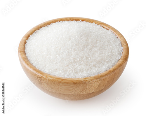 Granulated white sugar in wooden bowl isolated on white background with clipping path
