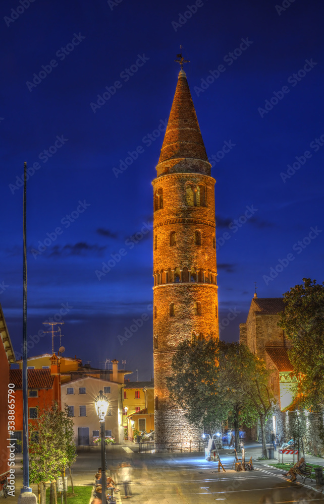 Bell Tower Of The Cathedral in Caorle, Veneto, Italia at night. HDR image. Long exposure time.