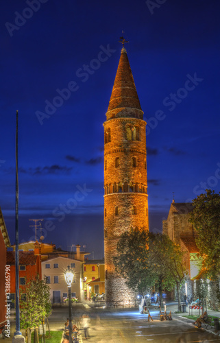 Bell Tower Of The Cathedral in Caorle  Veneto  Italia at night. HDR image. Long exposure time.
