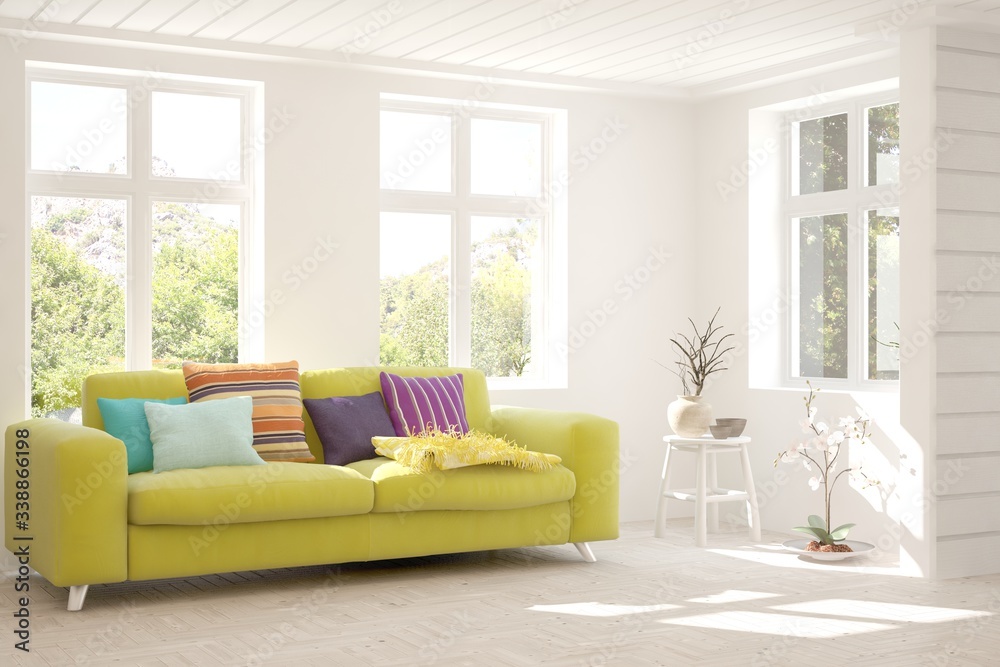 Fototapeta premium White living room with sofa and summer landscape in window. Scandinavian interior design. 3D illustration