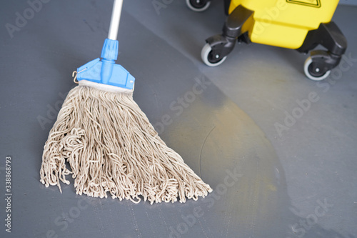 Mop and bucket, janitorial service.