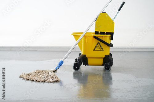 Mop and bucket, janitorial service.