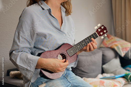 young woman with guitar