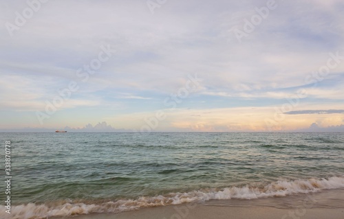Miami Beach. Gorgeous colorful view of turquoise water of Atlantic ocean and blue sky with white clouds. Beautiful nature background.