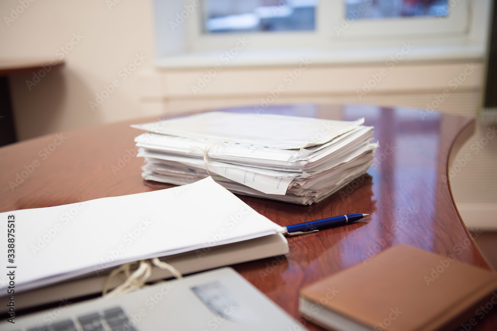Pile of unfinished documents on office desk, Stack of business paper. A file folders with documents and important documents. Pile of unfinished documents on office desk, Stack of business paper. A file folders with documents and important documents.