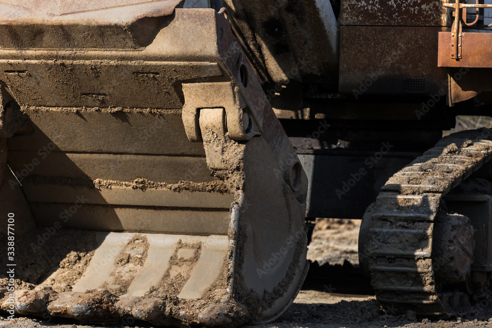 an excavator close up on an construction site outdoors