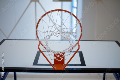 Closeup of basketball hoop © Fotografos