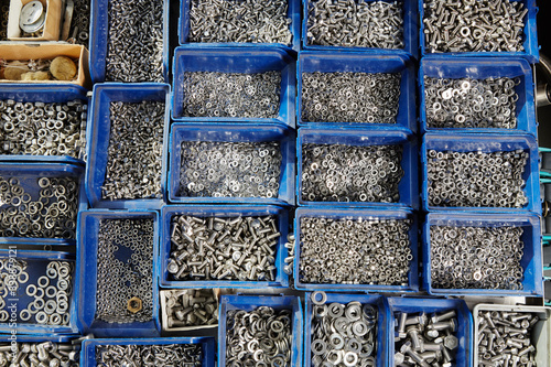 Nuts, bolts and screws in boxes