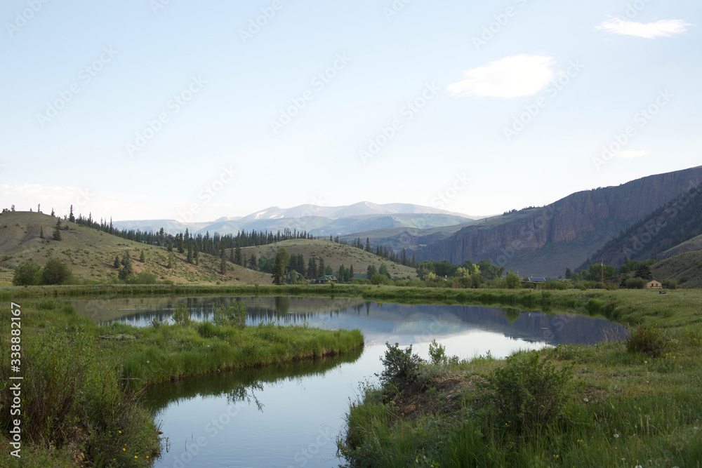 Alpine meadow lake reflection in Colorado Mountains Alpine meadow lake reflection in Colorado Mountains