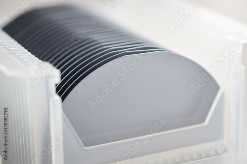 Silicon wafers in plastic container photo