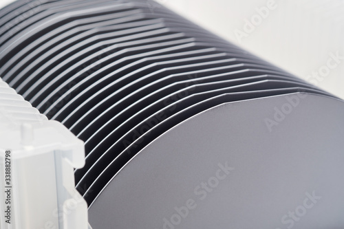 Fototapeta Naklejka Na Ścianę i Meble -  Silicon wafers in plastic container