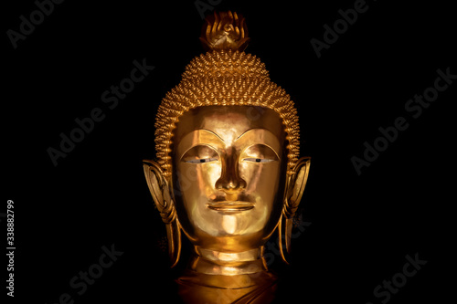Mystical Buddha statue, face of golden Buddha statue