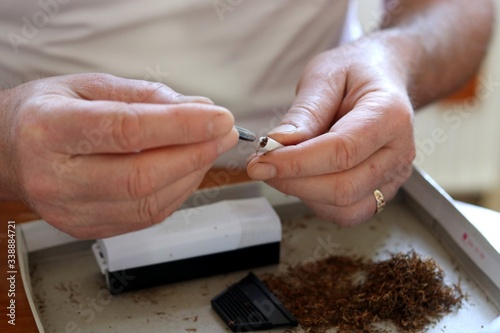 making cigarettes close-up tobacco