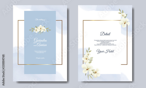 Elegant wedding card with beautiful floral and leaves template premium Vector