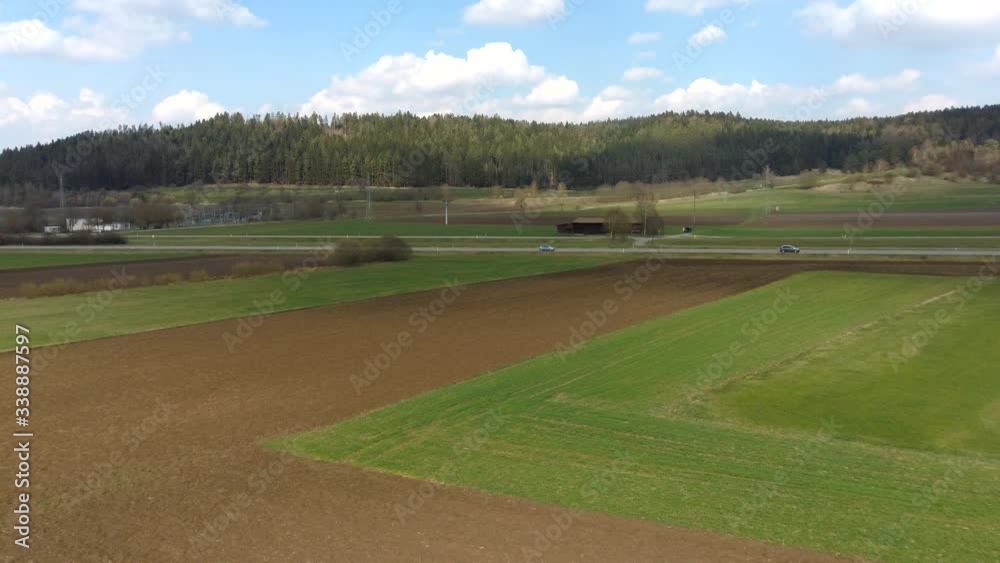 plowed and sown field, green grass partially sowed, plowed and sown field, green grass partially sowed,