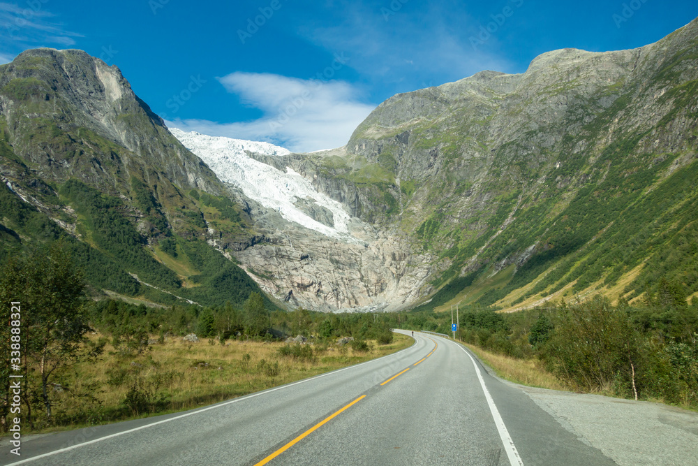 Norwegian mountain road with Josteldalsbreen glacier in the background