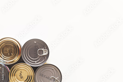 Tin, canned food isolated on white. Stock and proviant concept photo