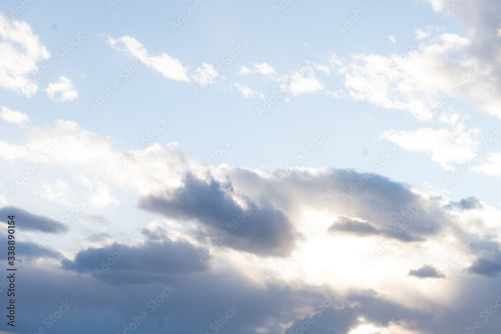 Fluffy white and storm clouds in sky Fluffy white and storm clouds in sky