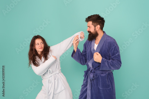 Defend yourself. Sexy girl pick fight with hipster. Challenging relations. Couple in love blue background. Family relations. Relations and bonds. Family values. Relations and relationship