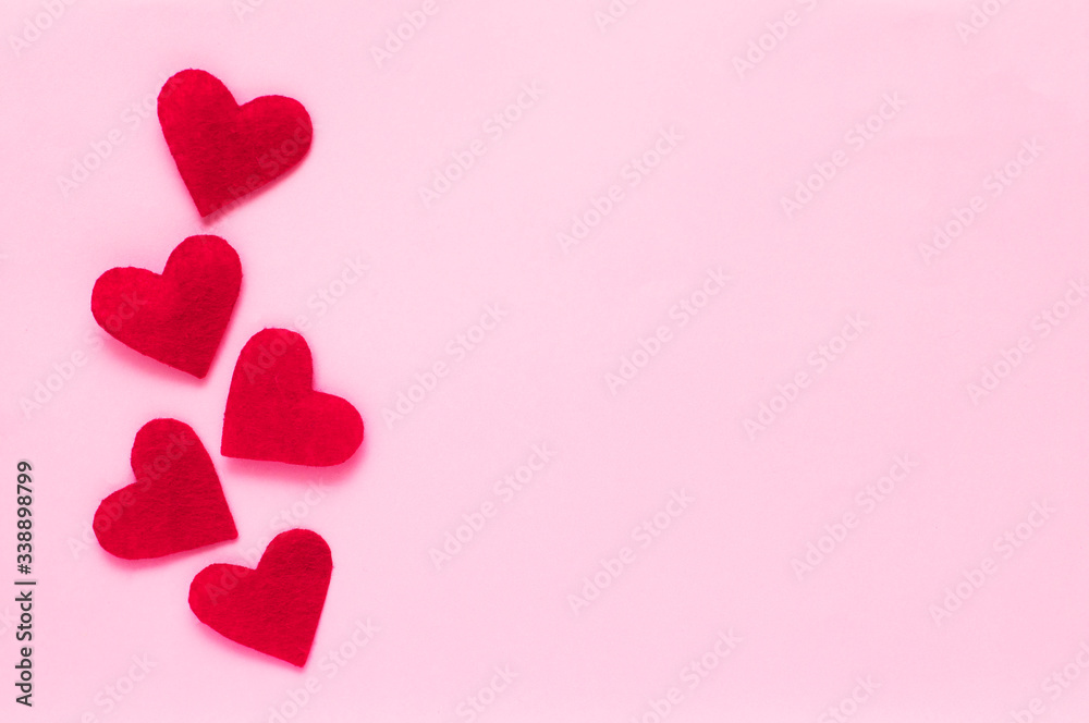 Red hearts isolated on pink background. Love, care, bonding, romance and valentine's day concept.