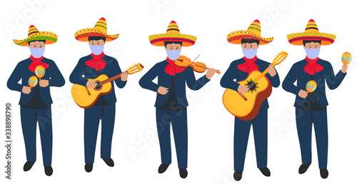 Mexican street musicians in sombrero and protective medical masks play musical instruments during the coronavirus pandemic COVID-19.