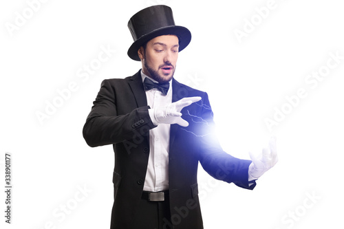 Canvas Print Magician performing a trick with electricity with his hands