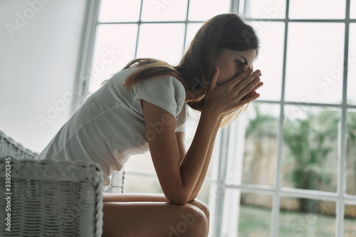 Free Download young woman looking out window - GFXLoad