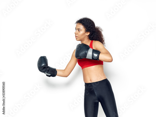 young woman with boxing gloves