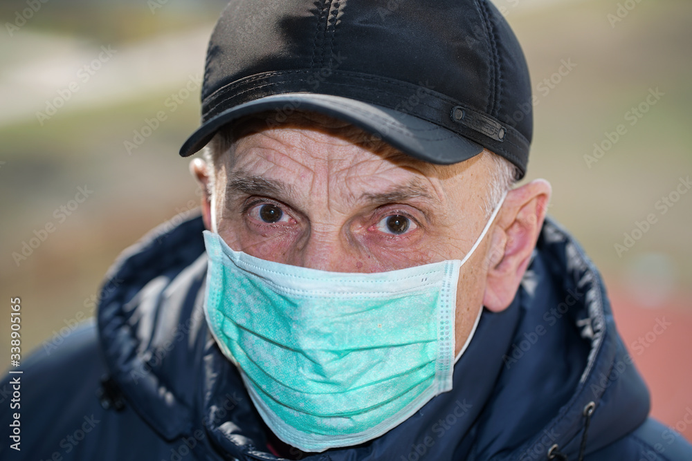 mature elderly man wearing protective facemask street portrait mature elderly man wearing protective facemask street portrait