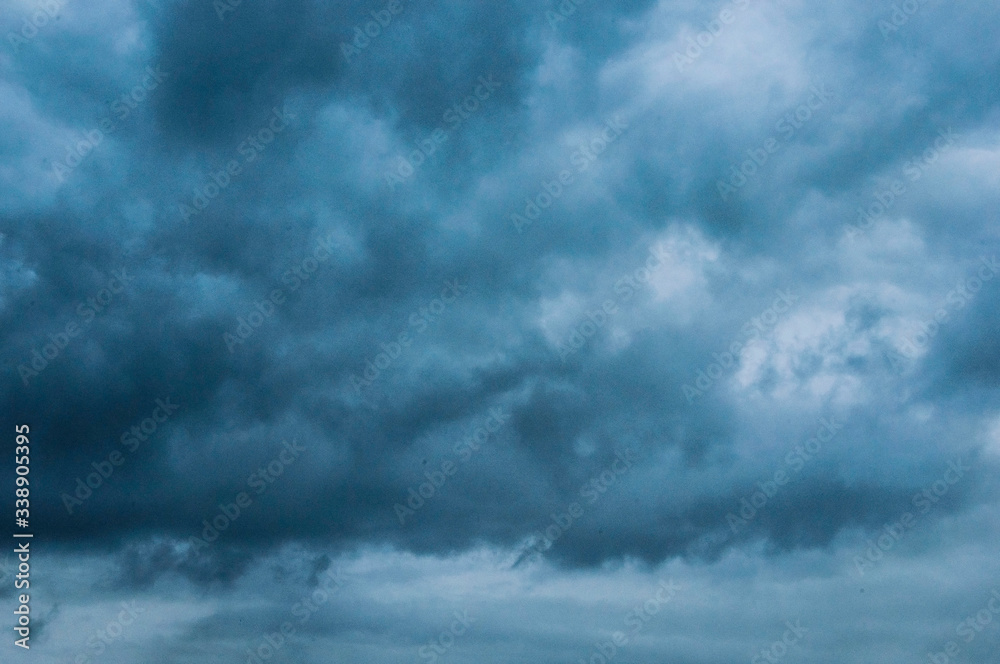 clouds before a thunderstorm. the sky is dark blue clouds before a thunderstorm. the sky is dark blue