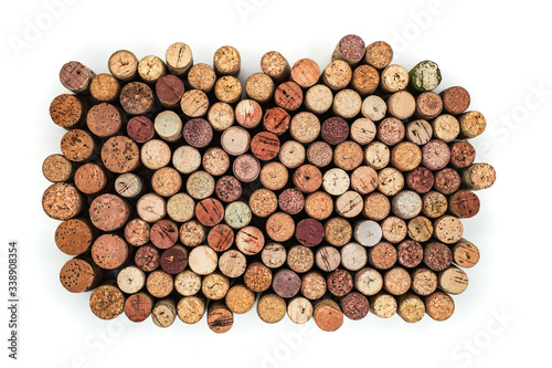 Old Used corks plugs from various types of wine on white background