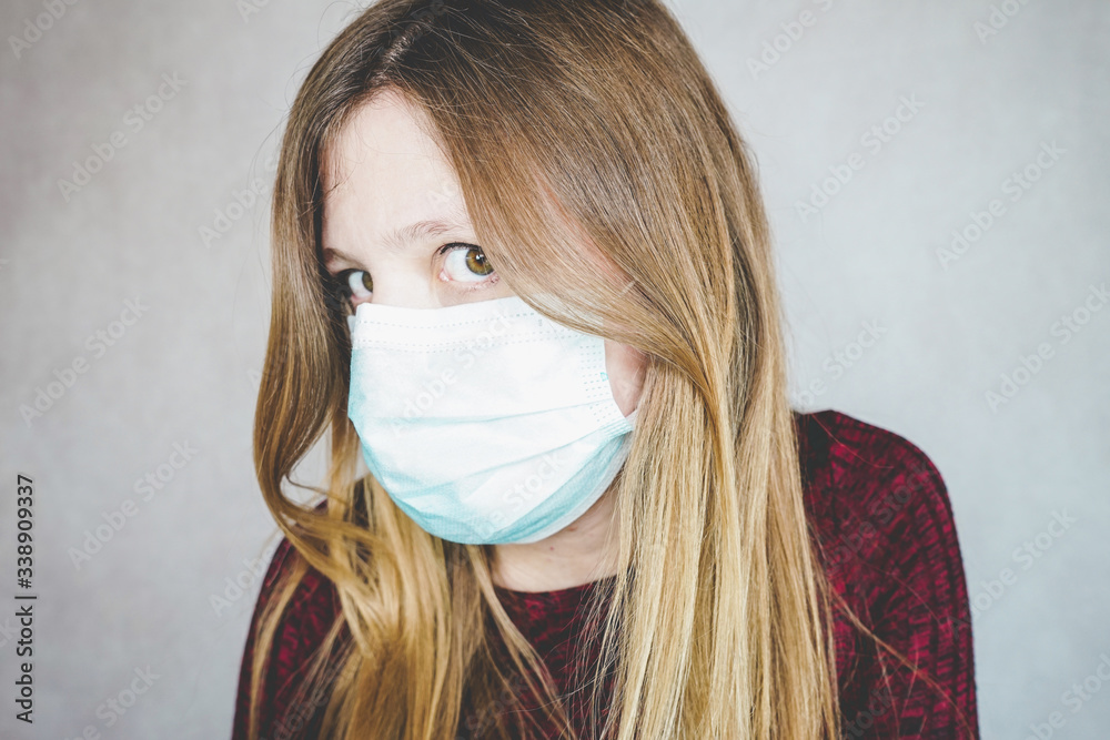 Young woman wearing a protective face mask Young woman wearing a protective face mask
