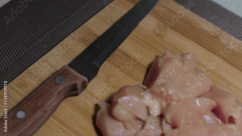 raw chicken meat on a cutting board, cooking at home