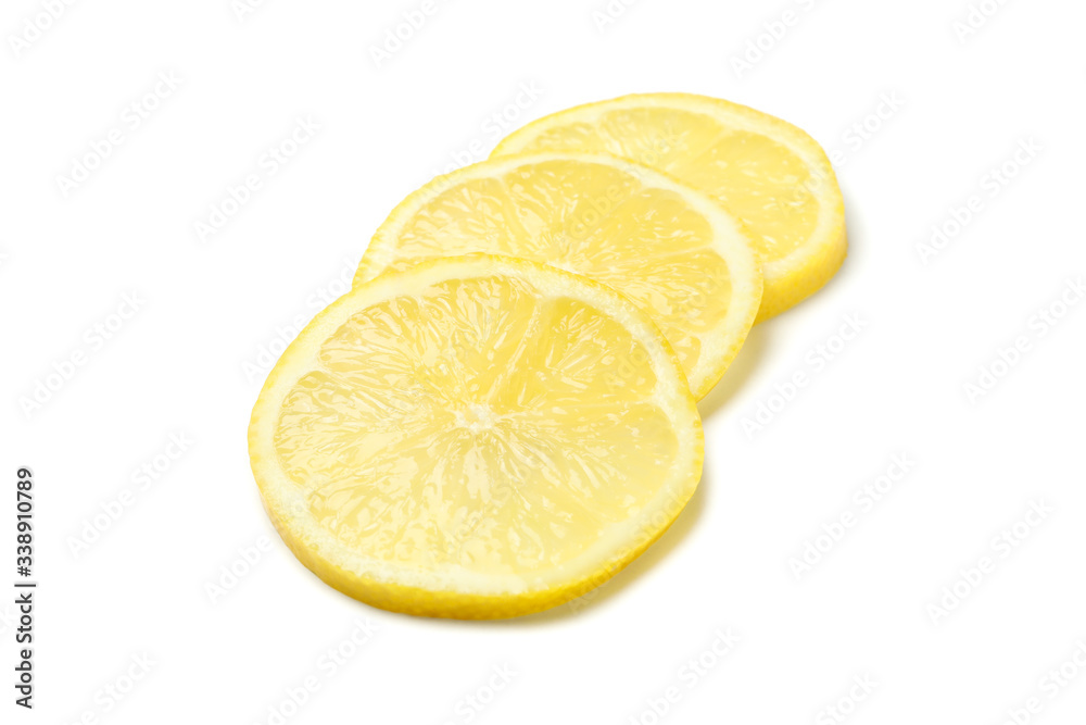 Lemons slices isolated on white background. Ripe fruit Lemons slices isolated on white background. Ripe fruit