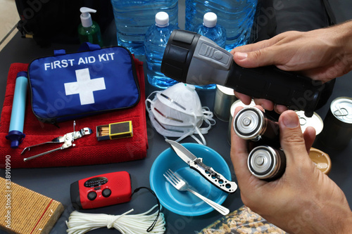 Disaster management includes preparing a disaster kit that can be contained in a go bag.These items should include a first aid kit,food,water,flashlight,radio,sleeping bag.Items that will help you. photo