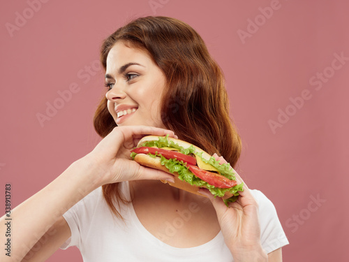 Beautiful charm woman hamburger fast food meal close-up
