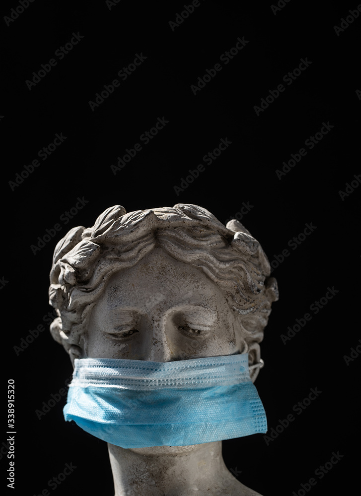 Italian statue in protective blue mask