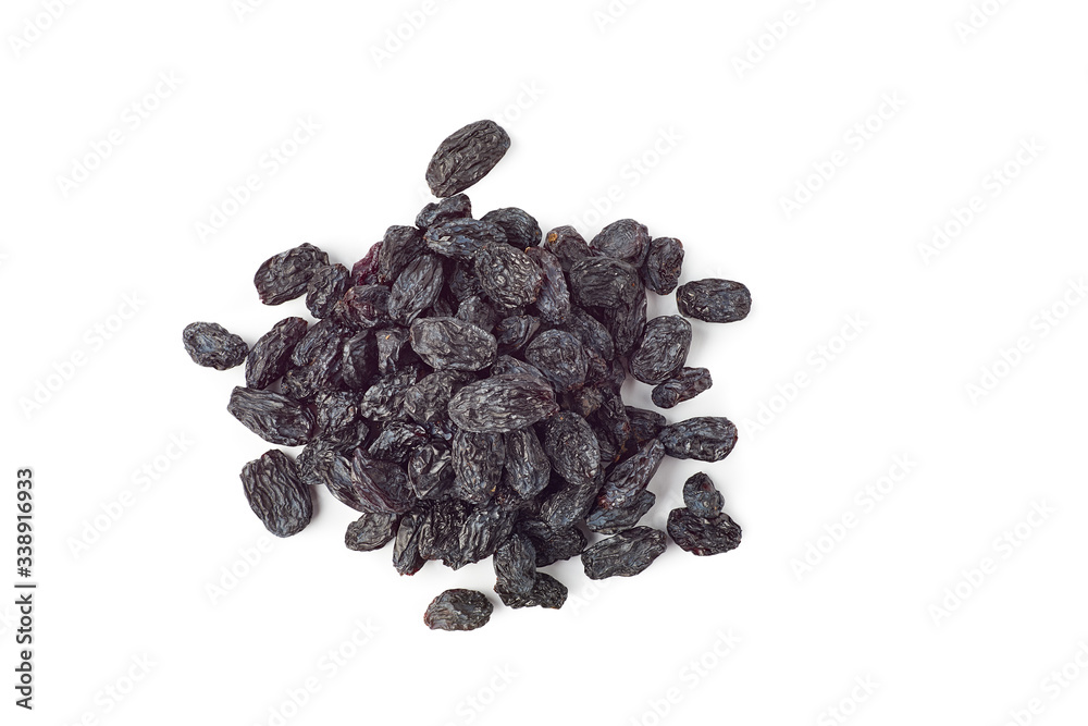 Heap of black raisins on white Heap of black raisins on white