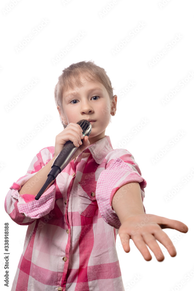 Little cute girl singing into a microphone on a white background Little cute girl singing into a microphone on a white background