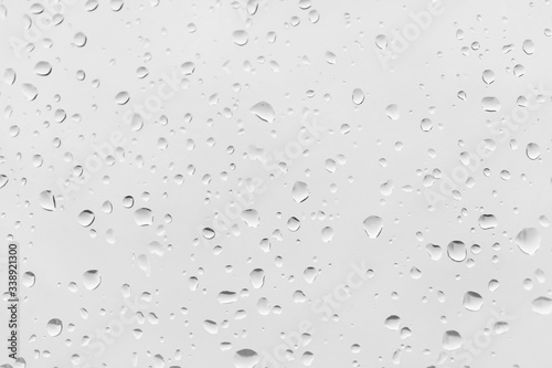 Raindrops water drop on window glass